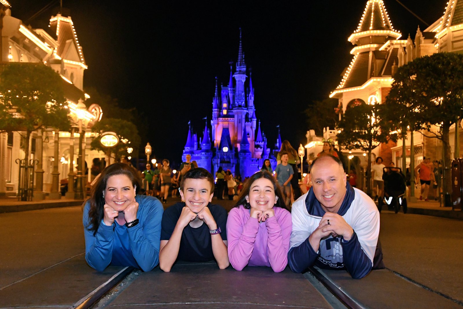 Evan Abramson and his family on Main Street at night